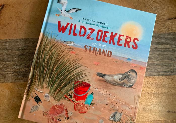 Wildzoekers op het strand