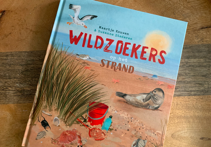 Wildzoekers op het strand